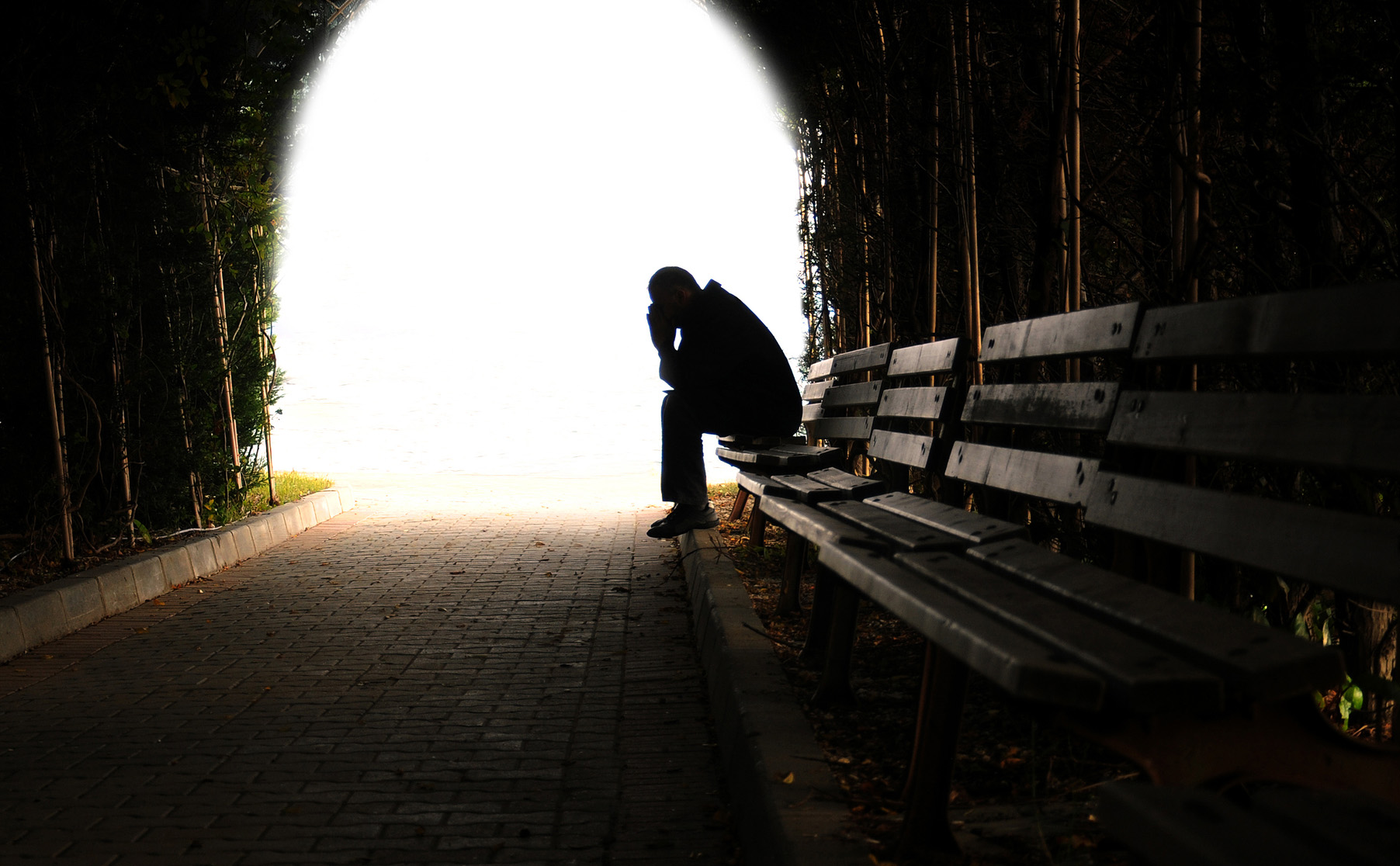 Image result for depressed man sitting on bench